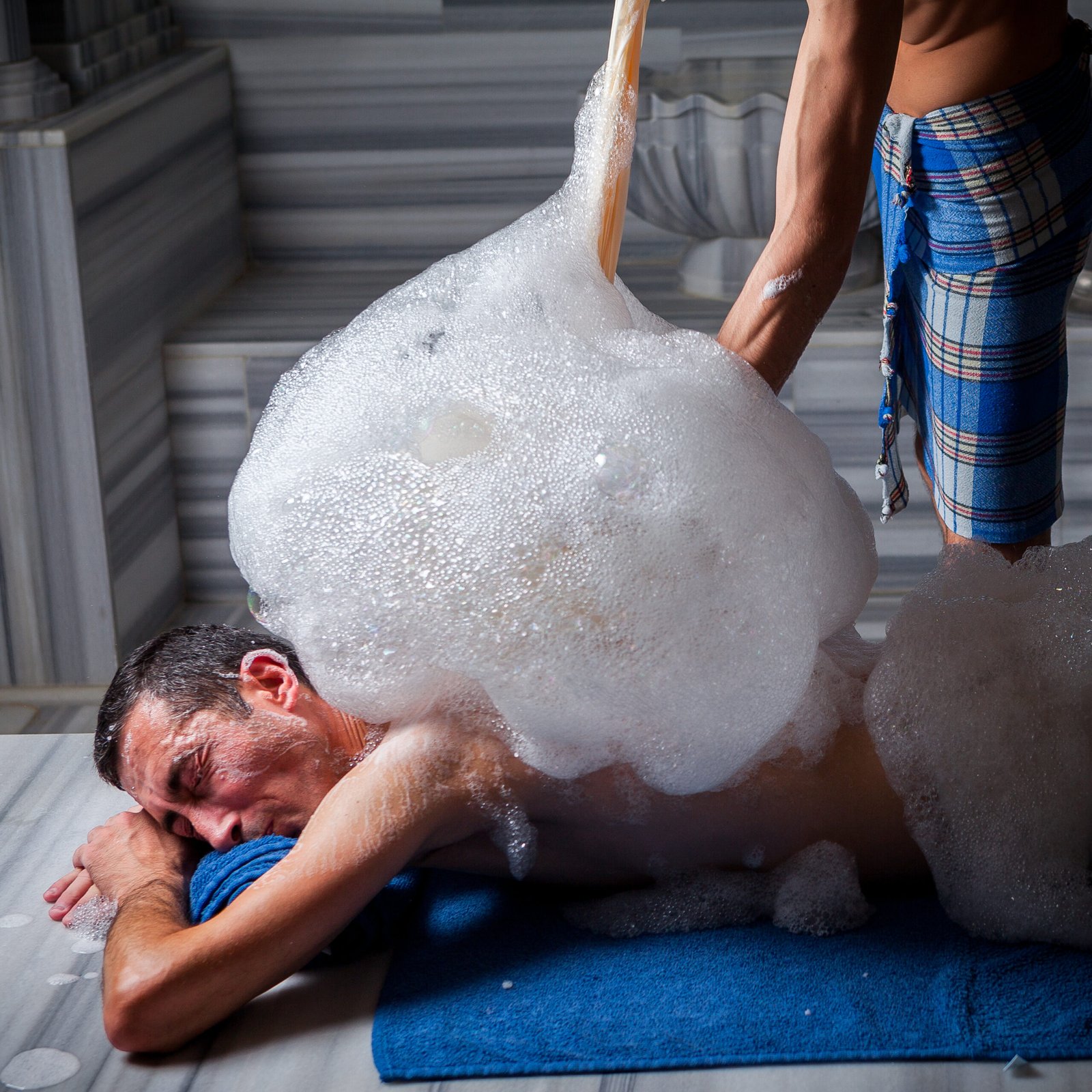 Traditional Moroccan bath treatment being performed in a luxury spa in Abu Dhabi, UAE.