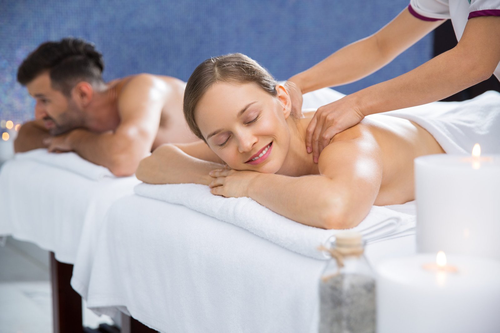 A relaxing Jacuzzi massage with water jets providing hydrotherapy to a person in a spa setting.